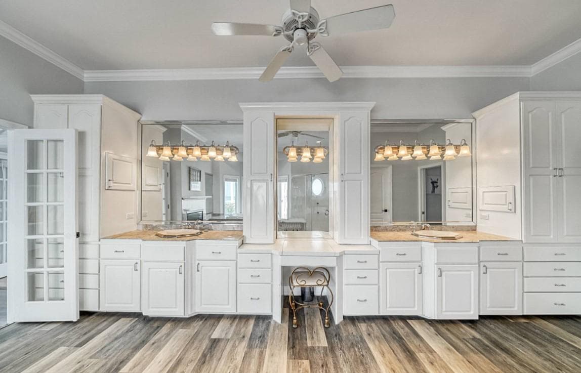 Luxury master bathroom vanity remodel with dual sinks and custom cabinetry